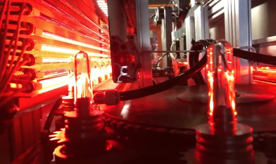 Juice bottle hot fill preform heater